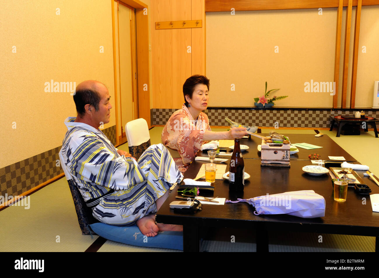 Senior couple in kimono, yukata at Ryokan which is japanese style hotel, Japan Stock Photo