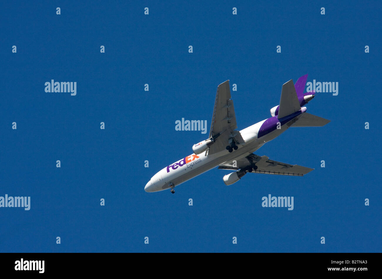 Fedex cargo plane against blue sky Seattle Washington WA Stock Photo