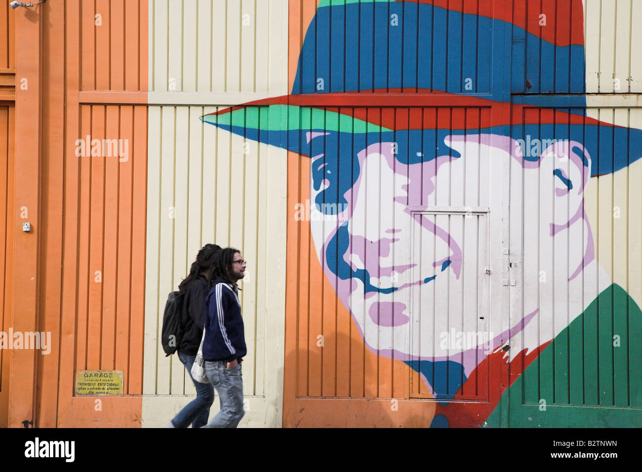 Street painting of famous tango singer, Carlos Gardel in the Abasto area of Buenos Aires in Argentina. Stock Photo