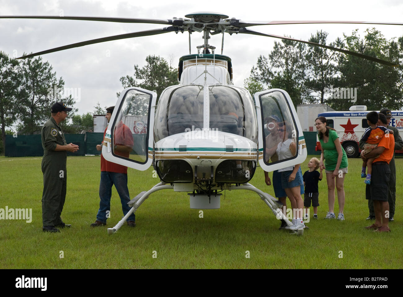 people looking at sheriffs helicopter at helicopter fair Gainesville ...