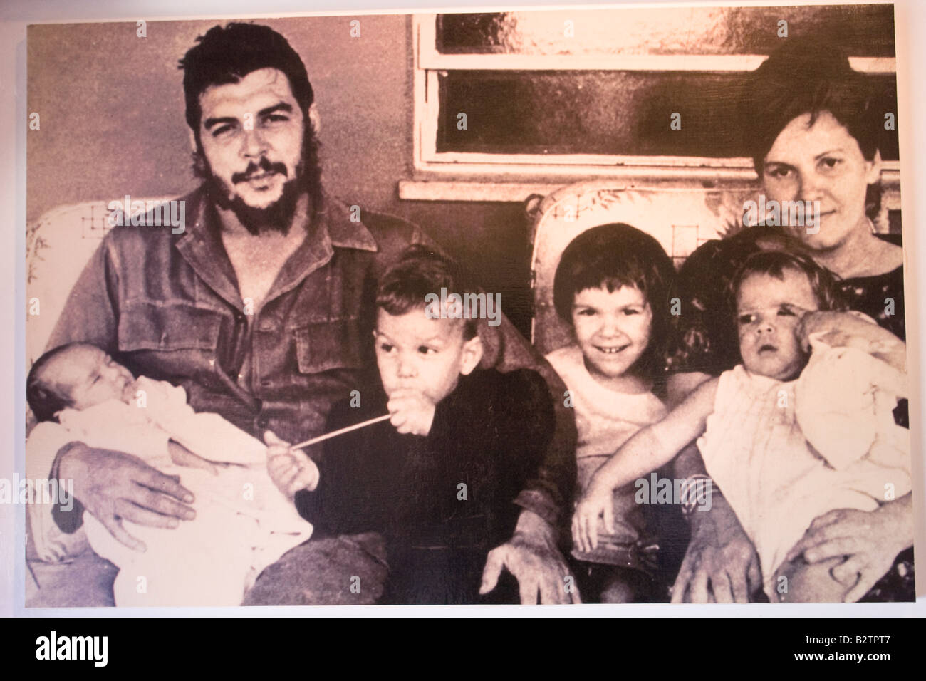 Photo of Ernesto Che Guevara with his wife Aleida March and their children exhibited in the Museum in Alta Gracia, Cordoba Stock Photo