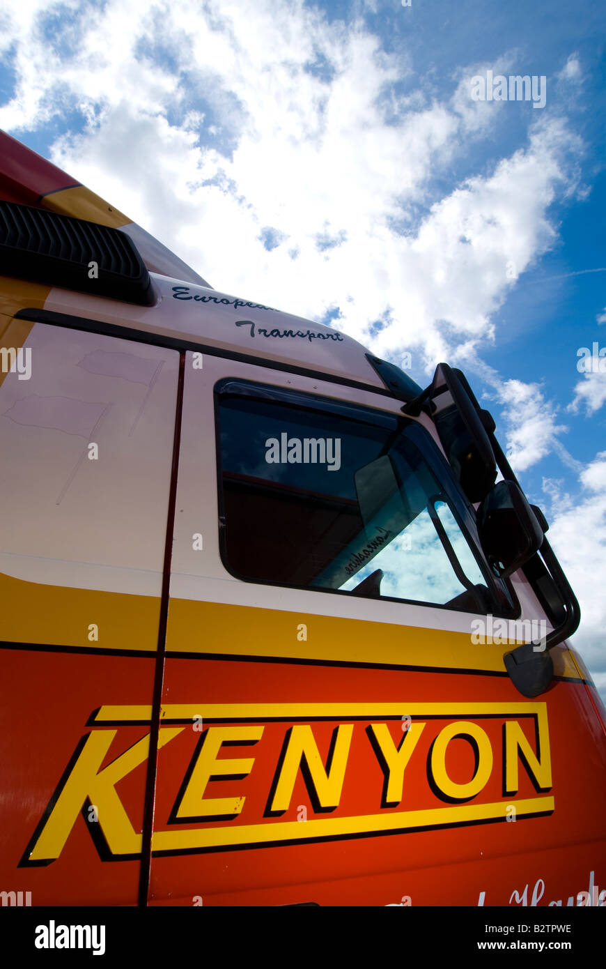 Kenyon road haulage wagon cab against a blue and cloudy sky Stock Photo