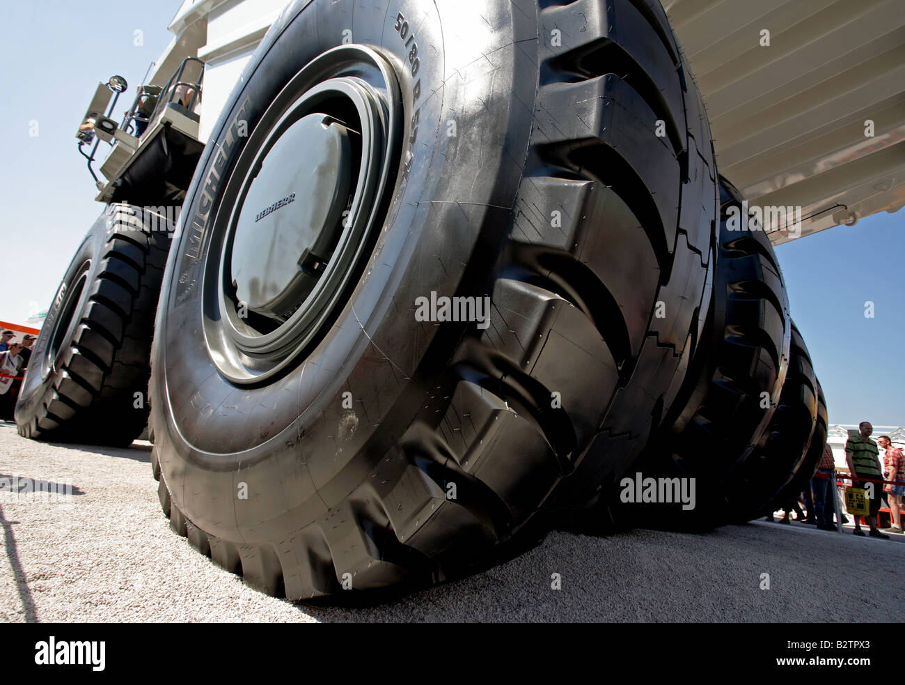Wheel loader wheels Stock Photo - Alamy