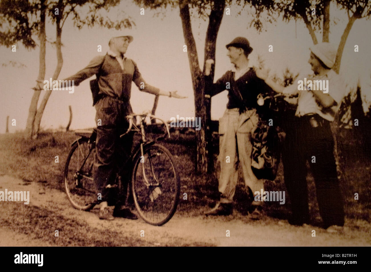 Photo of Ernesto Che Guevara riding his motorized bicycle 'La poderosa II' and his friend Alberto Granado doing autostop. Stock Photo