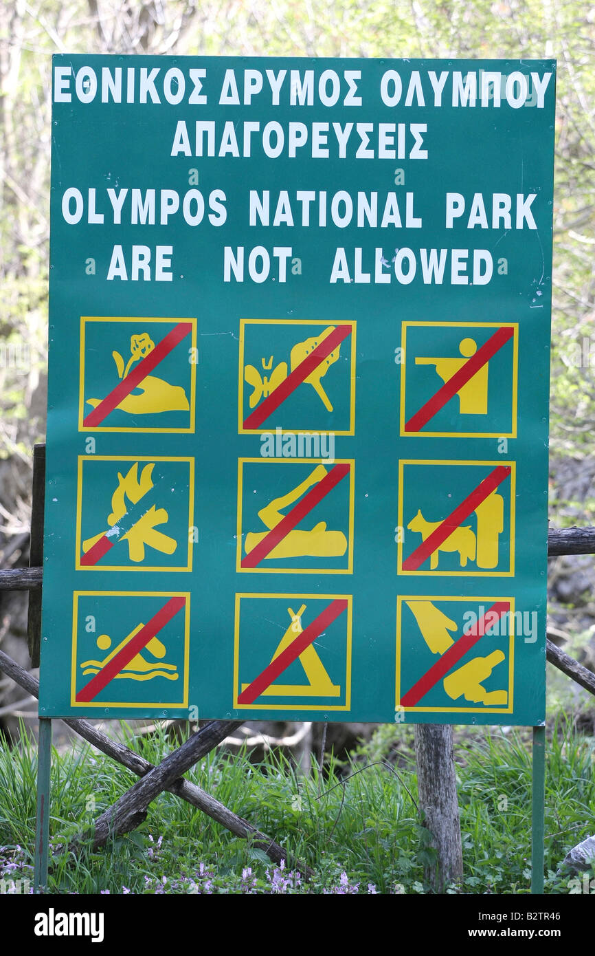 Greece Macedonia Mount Olympus National Park Sign prohibiting hunting camping swimming and picking flowers Stock Photo