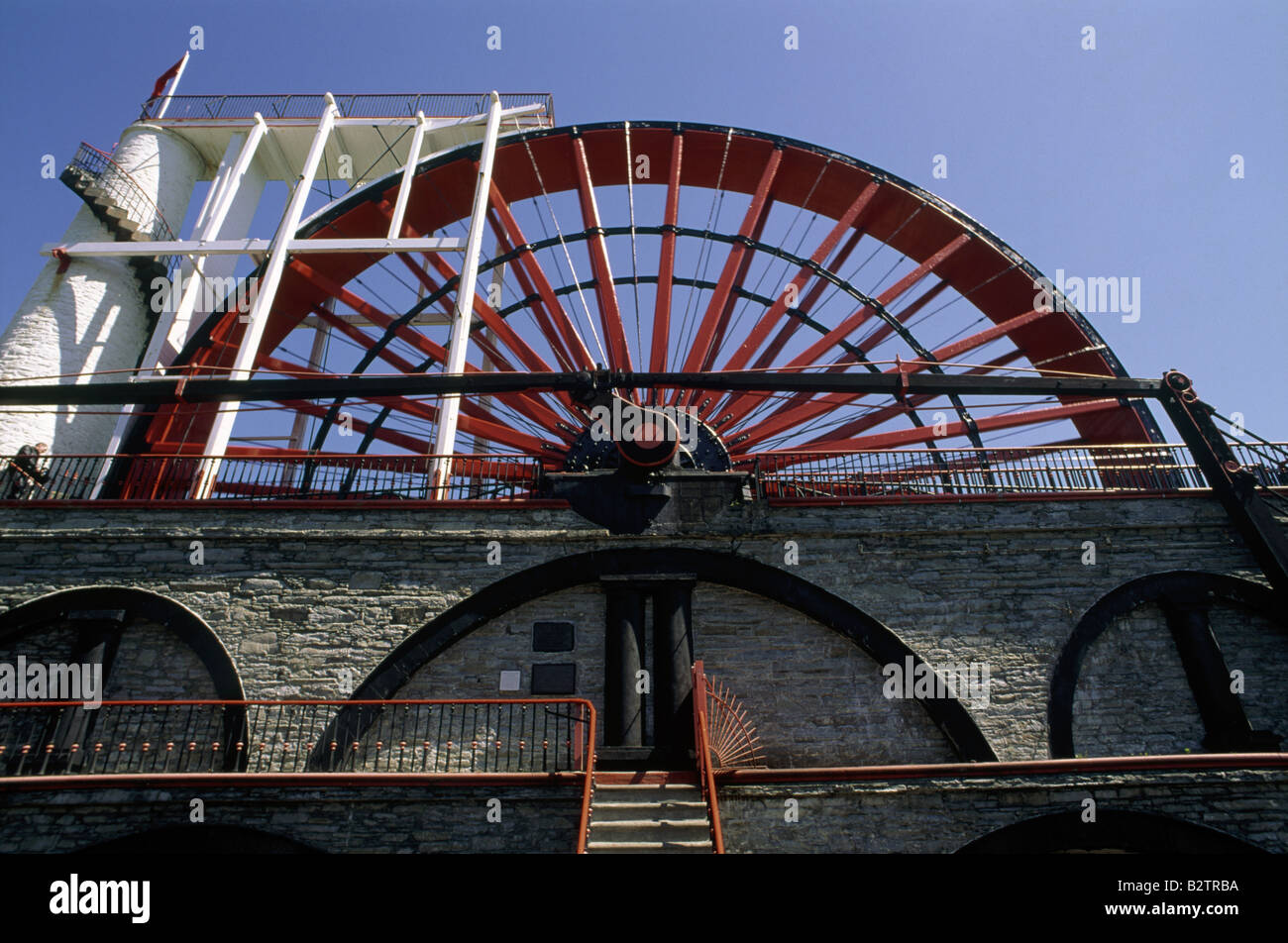 The Great Laxey Wheel From ground Red ironwork LAXEY ISLE OF MAN ENGLAND Stock Photo