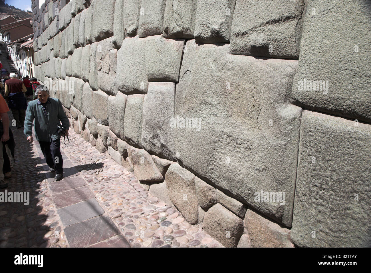Famous 12 angled stone in Calle Hatun Rumiyoc, the most angles in an original Inca wall found in Cusco, Peru in South America. Stock Photo