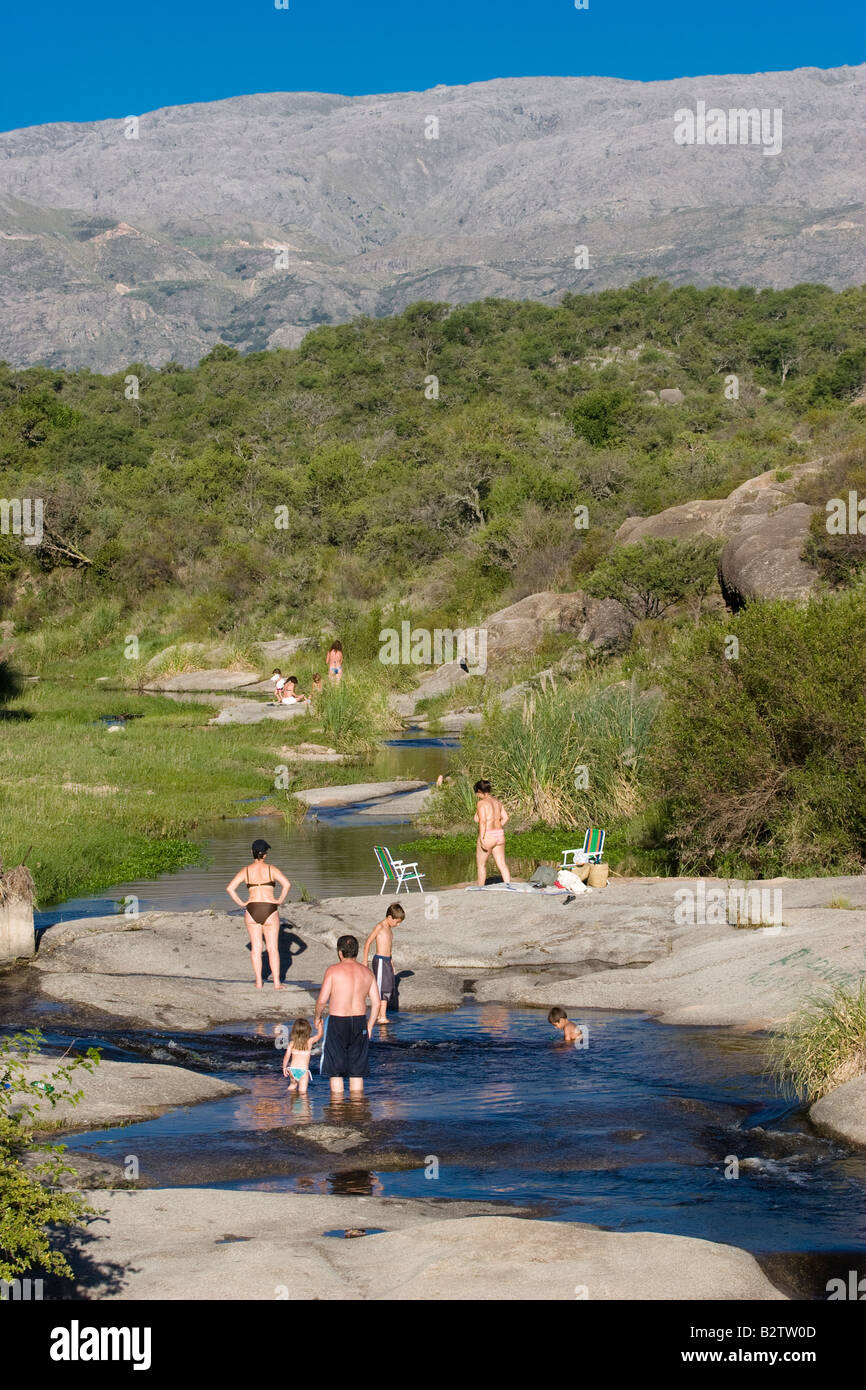 Tourists enjoying a clear summer day in Rio Chico (Small River) near Nono, Traslasierra, Cordoba, Argentina Stock Photo