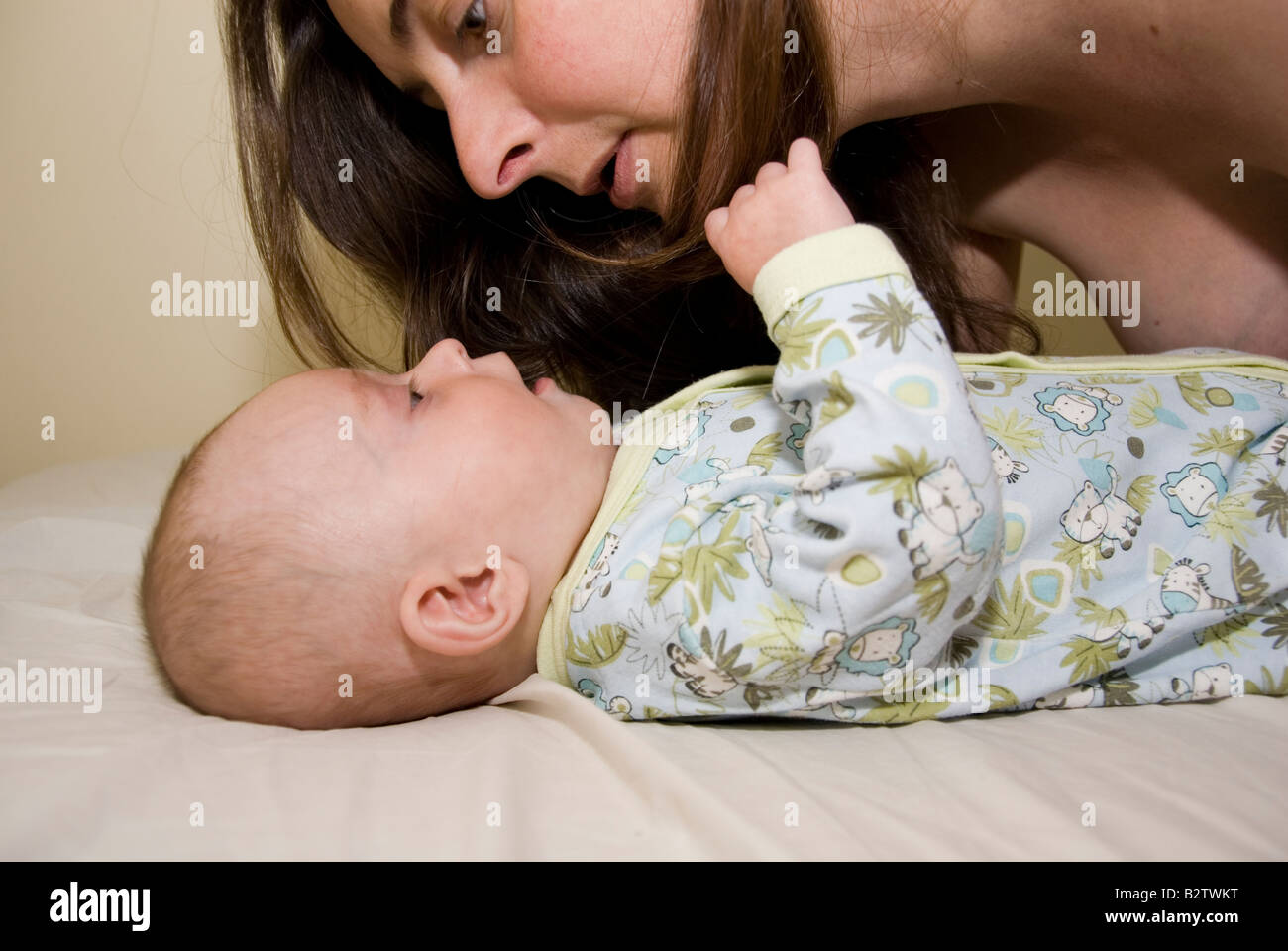 Baby Boy Joshua Kailas Hudson Aged 15 Weeks Looking up at Mother Deborah Waters Stock Photo