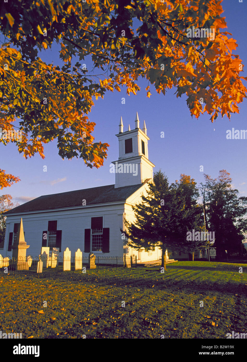 A beautiful country church in the October color change at sunset near