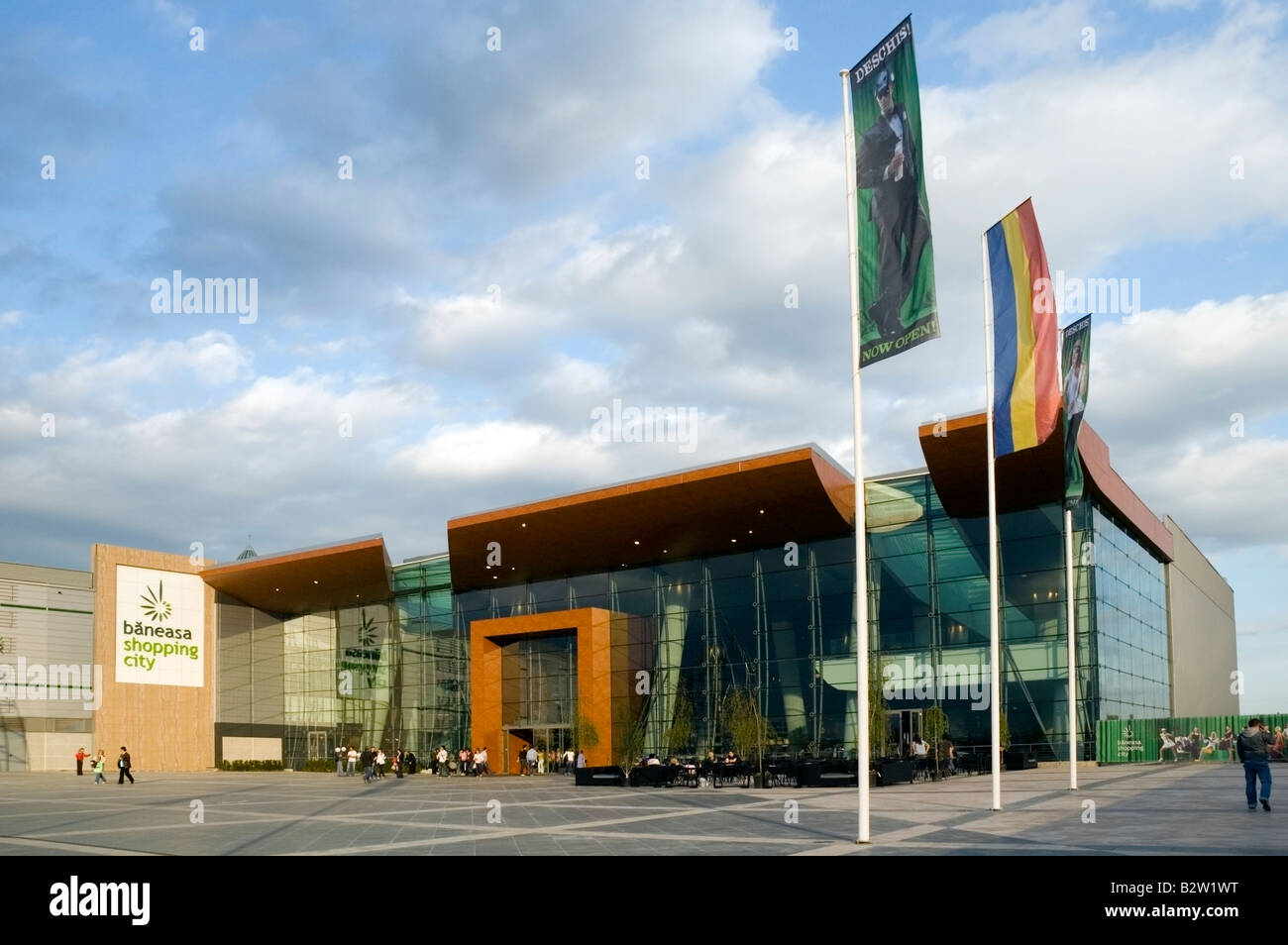 Baneasa new modern and contemporary exterior of shopping centre mall and square with flags, Bucharest, Romania, Europe, EU Stock Photo