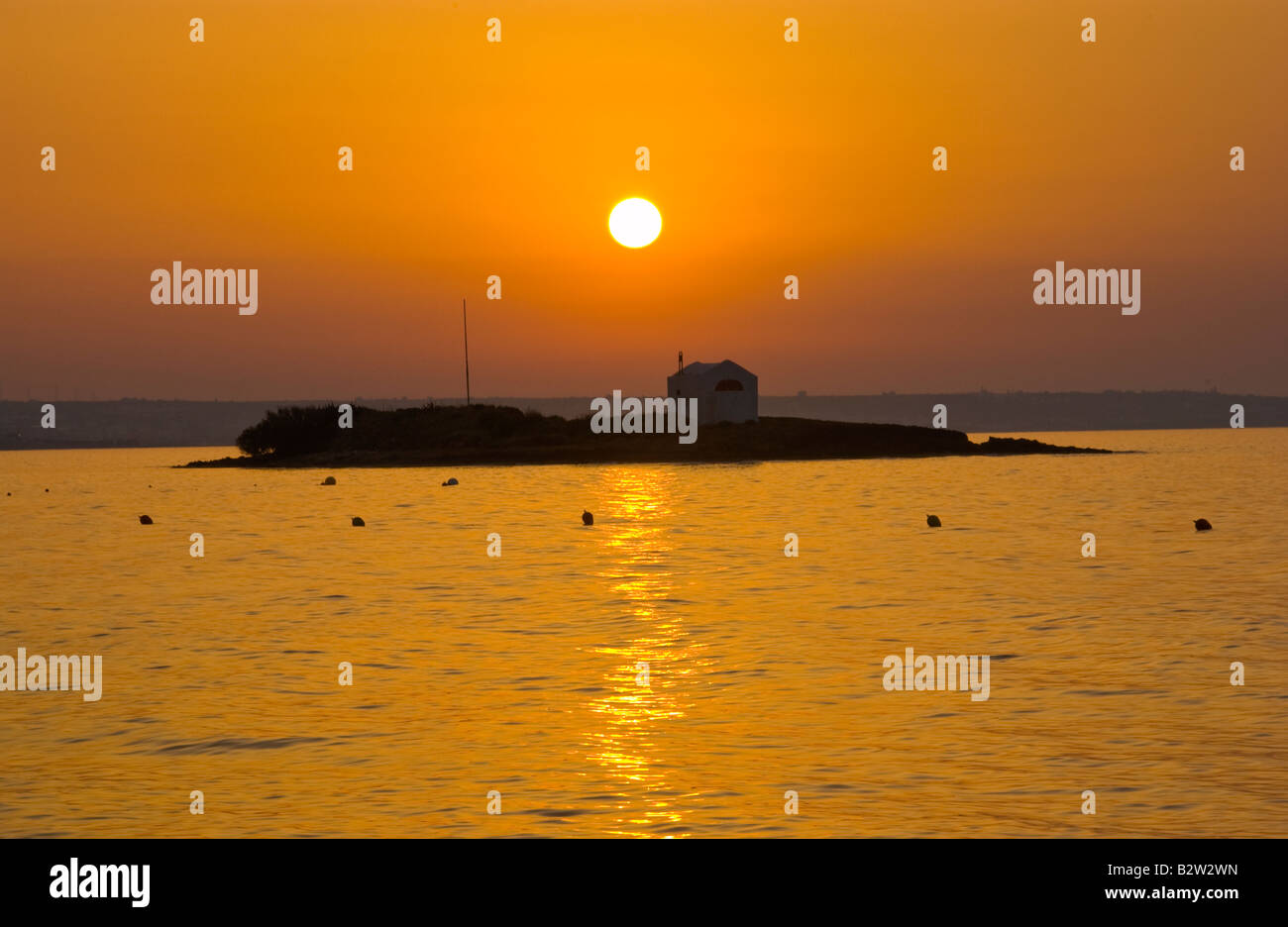 Sunset over Malia on the Greek Mediterranean island of Crete GR EU Stock Photo
