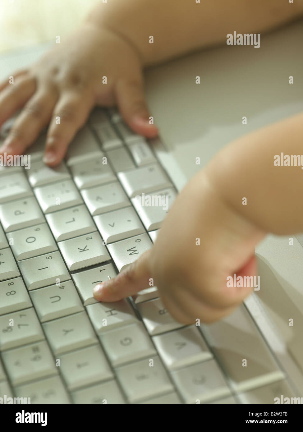 Infant boy computer keyboard hi-res stock photography and images - Alamy