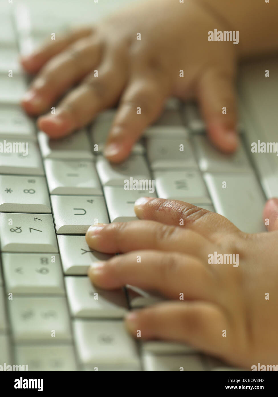 Infant boy computer keyboard hi-res stock photography and images - Alamy