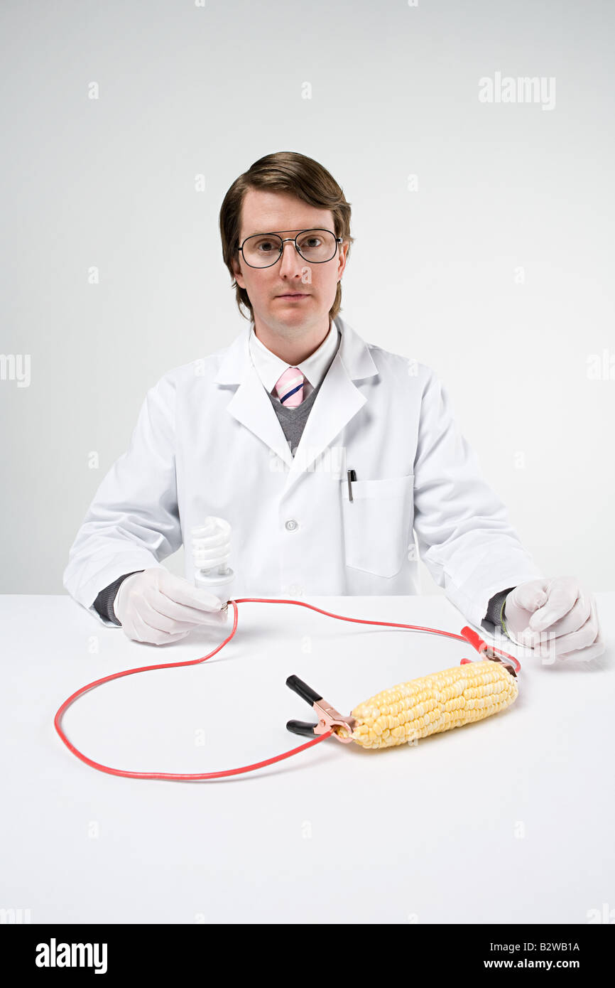 Scientist with sweetcorn and lightbulb Stock Photo