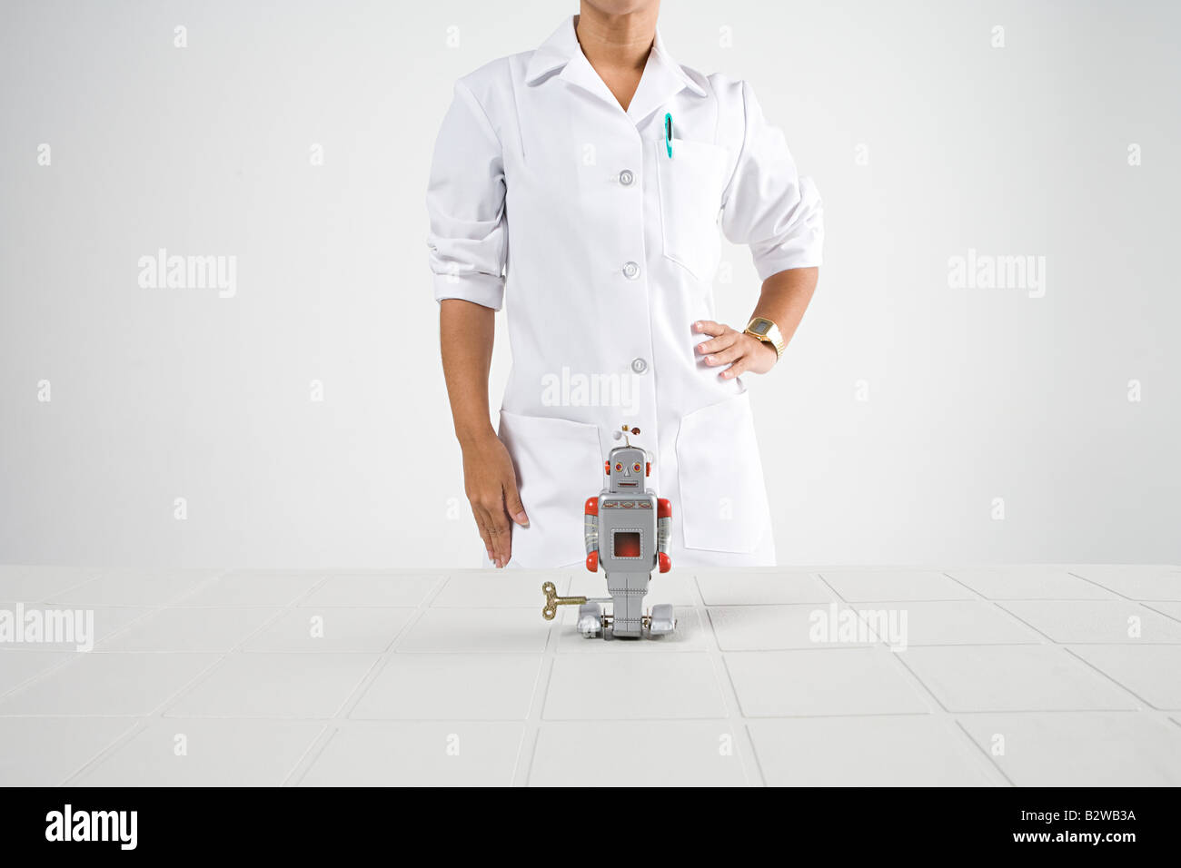 Scientist and robot Stock Photo