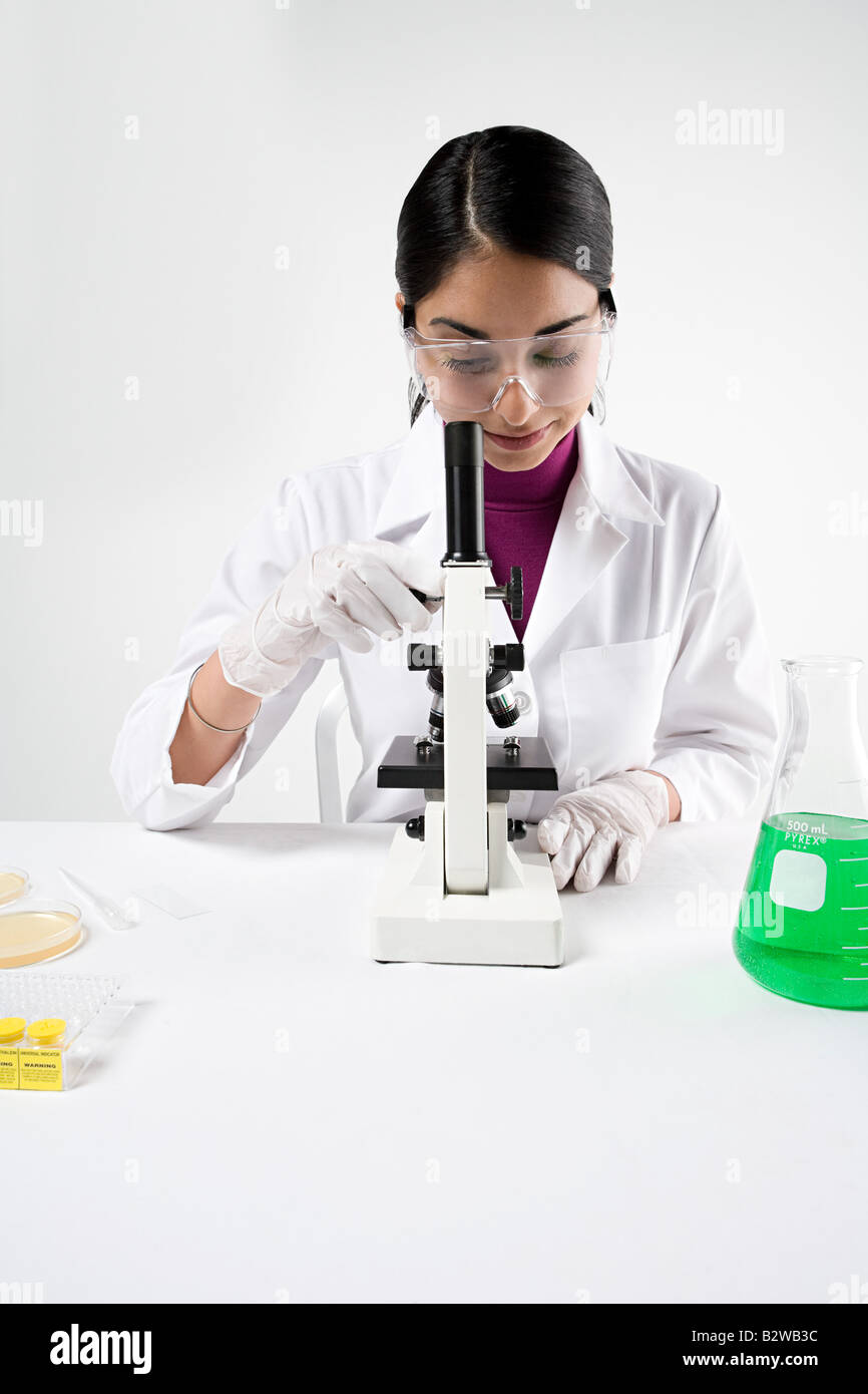 Scientist with microscope Stock Photo