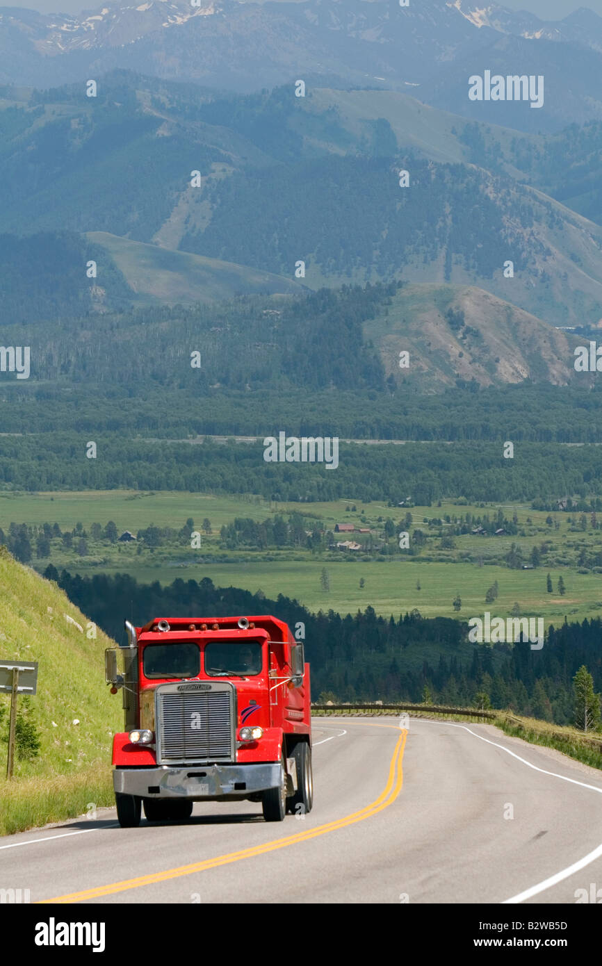 Dump truck traveling over the high mountain Teton Pass on Wyoming