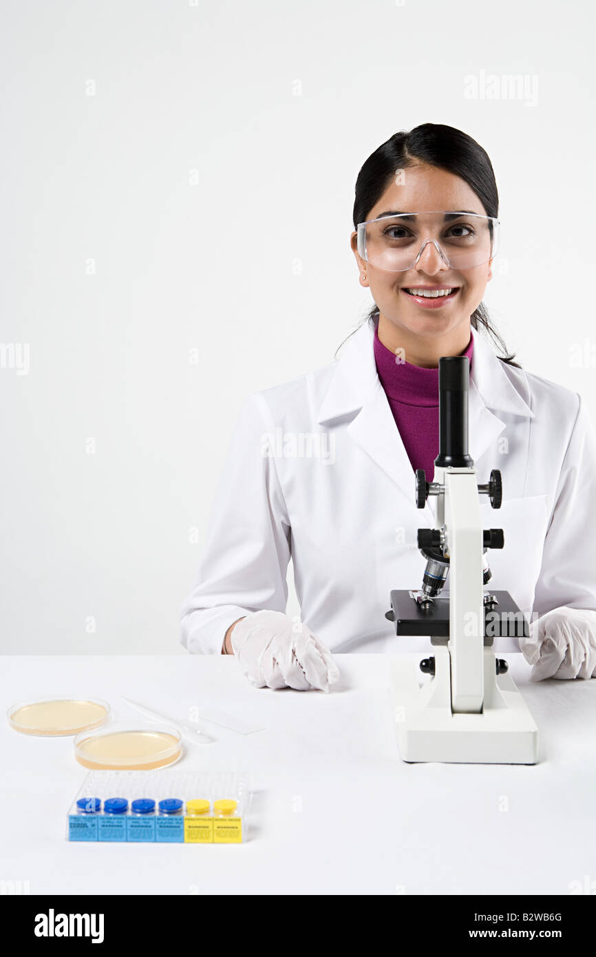 Scientist with microscope Stock Photo