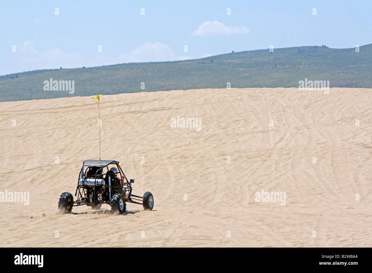 Dune buggy driving on sand dunes at St Anthony Idaho Stock Photo Alamy