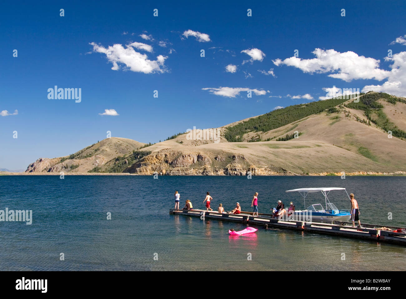 People on a boat dock at Mackay Reservoir in Custer County Idaho Stock Photo