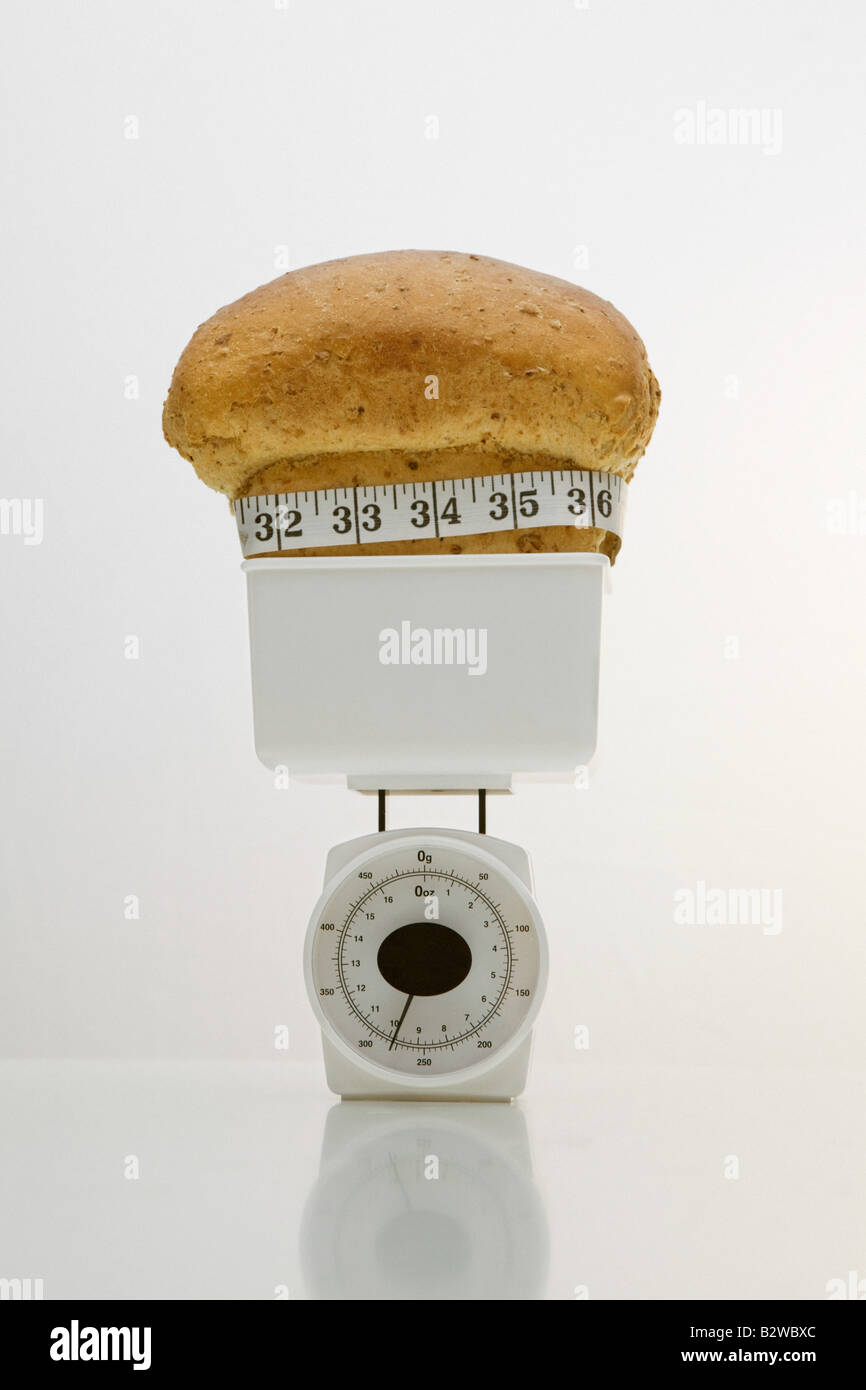 The Weight Of Bread Loaf Of Bread On The Scales Stock Photo, Picture and  Royalty Free Image. Image 59289355.