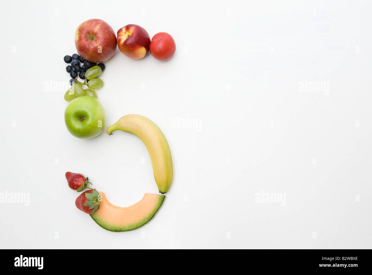 Fruit in the shape of the number five Stock Photo