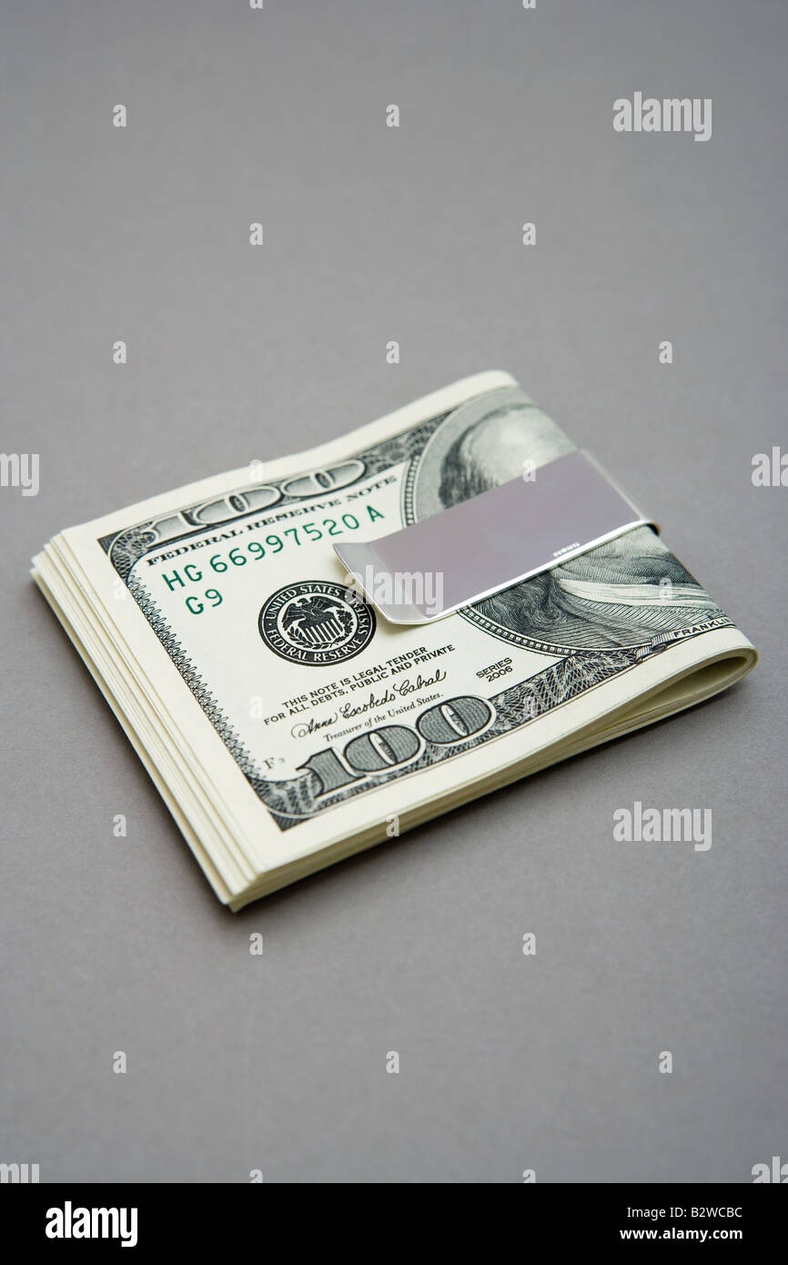 One hundred dollar bills in money clip Stock Photo