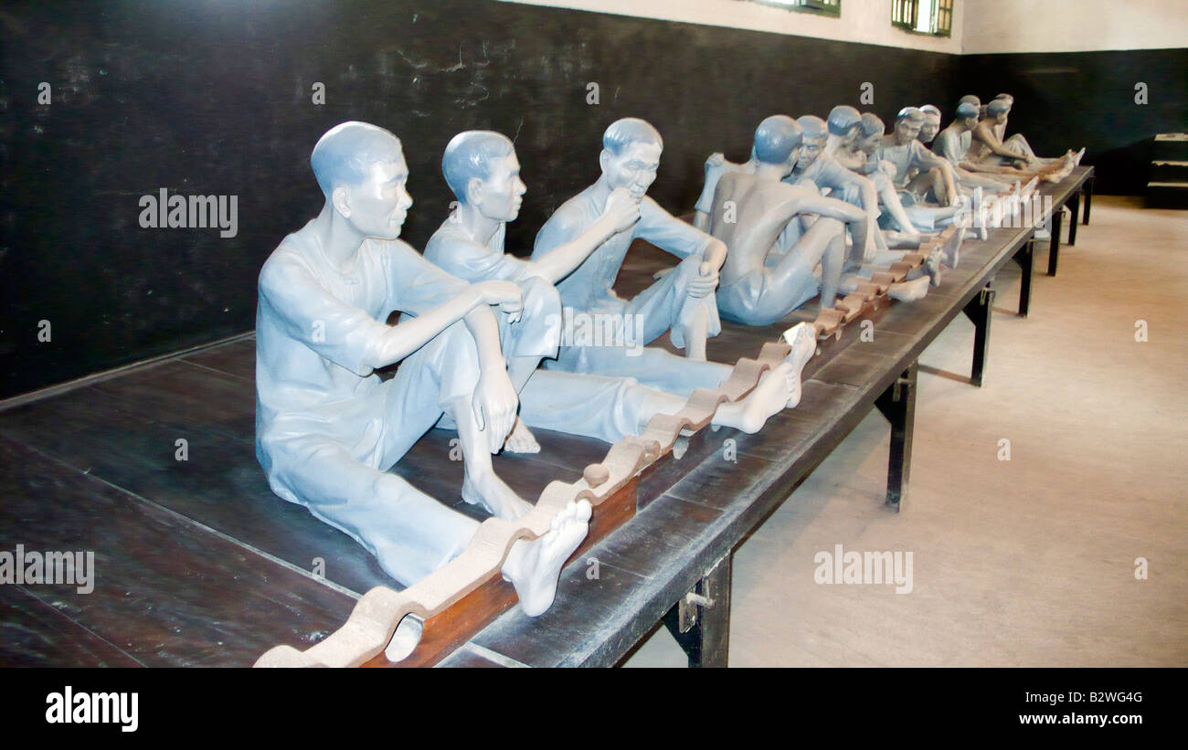 Model of prisoners in leg shackles Hoa Lo prison later called the Hanoi Hilton Vietnam Stock Photo