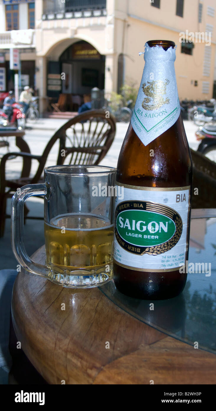 Cold mug and bottle of popular Saigon beer Hoi An Vietnam Stock Photo