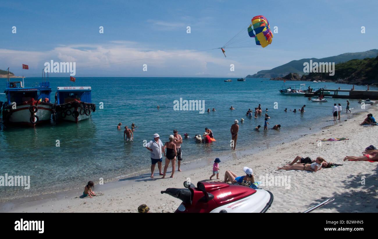 Popular island party cruise Number 4 stops at sandy beach Tam Island off Nha Trang Vietnam Stock Photo