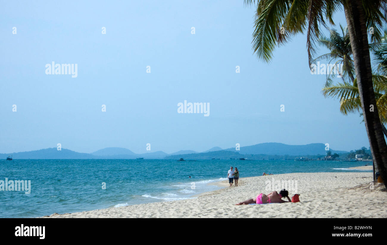 Pink bikini woman lies beneath palm tree Long Beach Phu Quoc Island ...