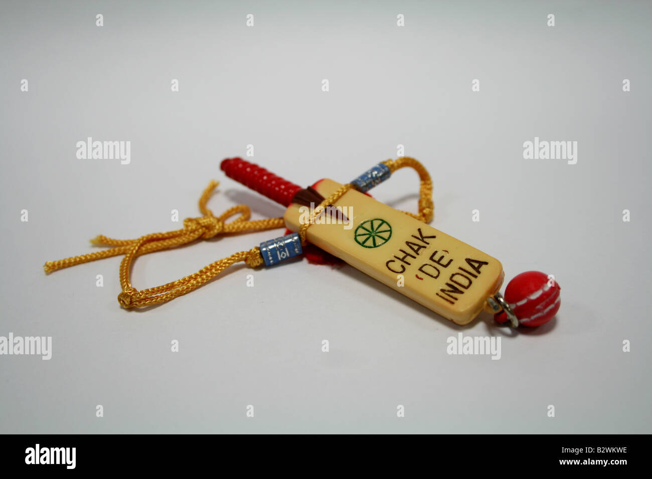 Bat Raksha Rakhi or wrist band with Cricket bat and ball theme given by sister to ...