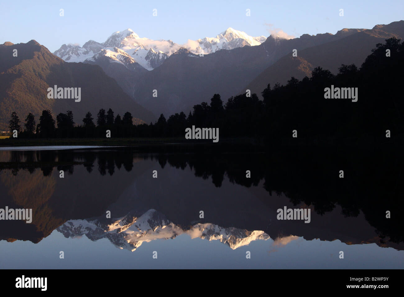Mirror reflection of Mt Cook in Lake Matheson in Westland NP, on the ...