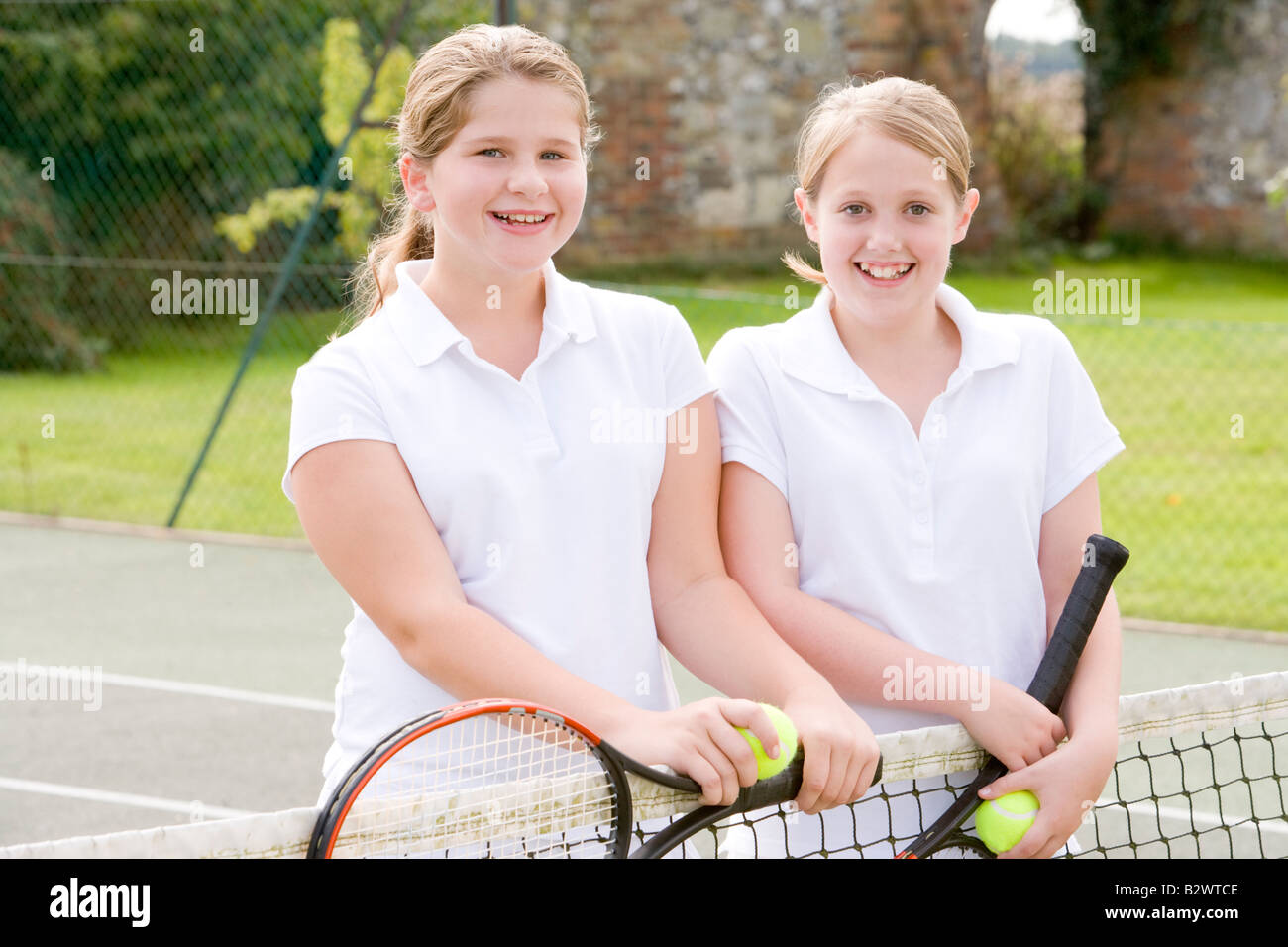 Two girls tennis rackets hires stock photography and images Alamy
