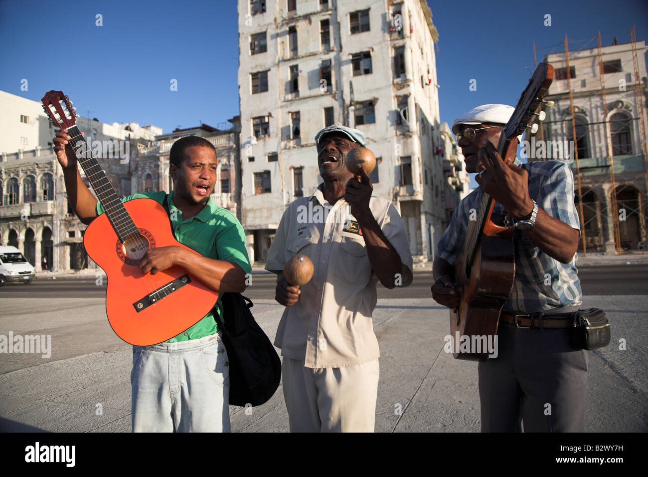 Local musicians play on the Malecon in Havana, Cuba Stock Photo
