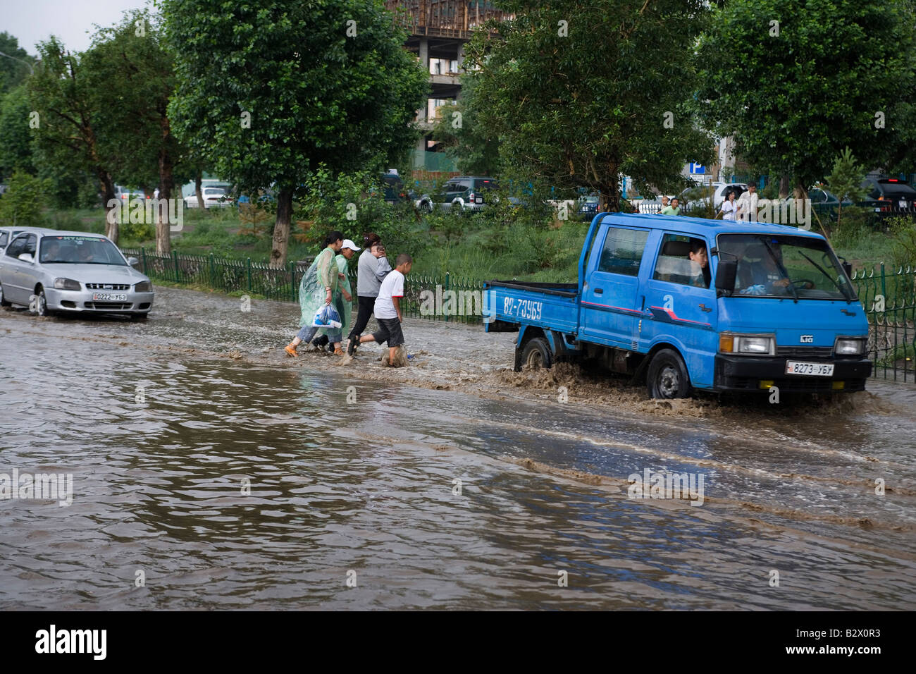 After a rain storm the streets of Ulaanbaatar are immediatly flooded ...