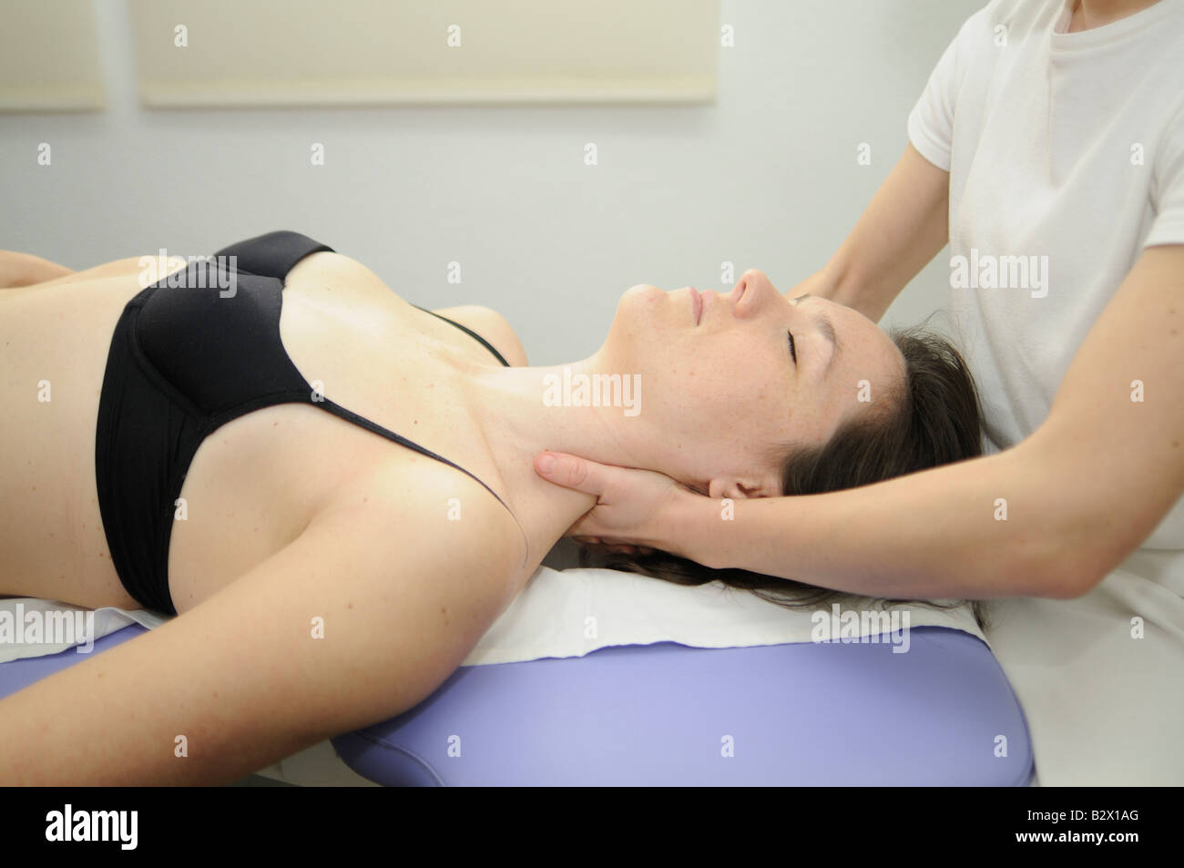 Manual cervical traction. Physical therapy (Physiotherapy Stock Photo -  Alamy