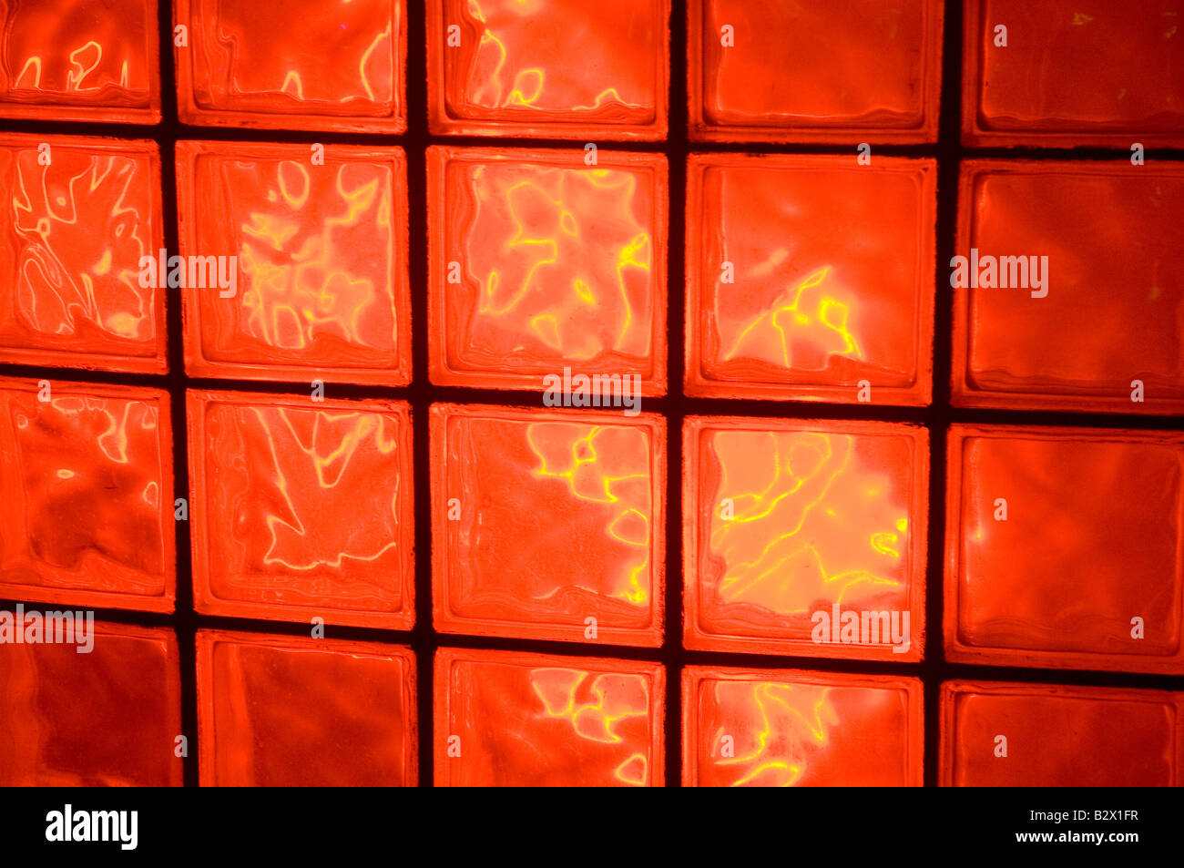 Red lit glass blocks Stock Photo Alamy