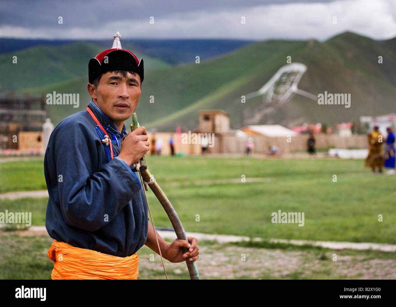 Week of the Naadam Festival celebrating the 800th anniversary of the Mongolian State Archery competitor with the face of Ghengis Stock Photo
