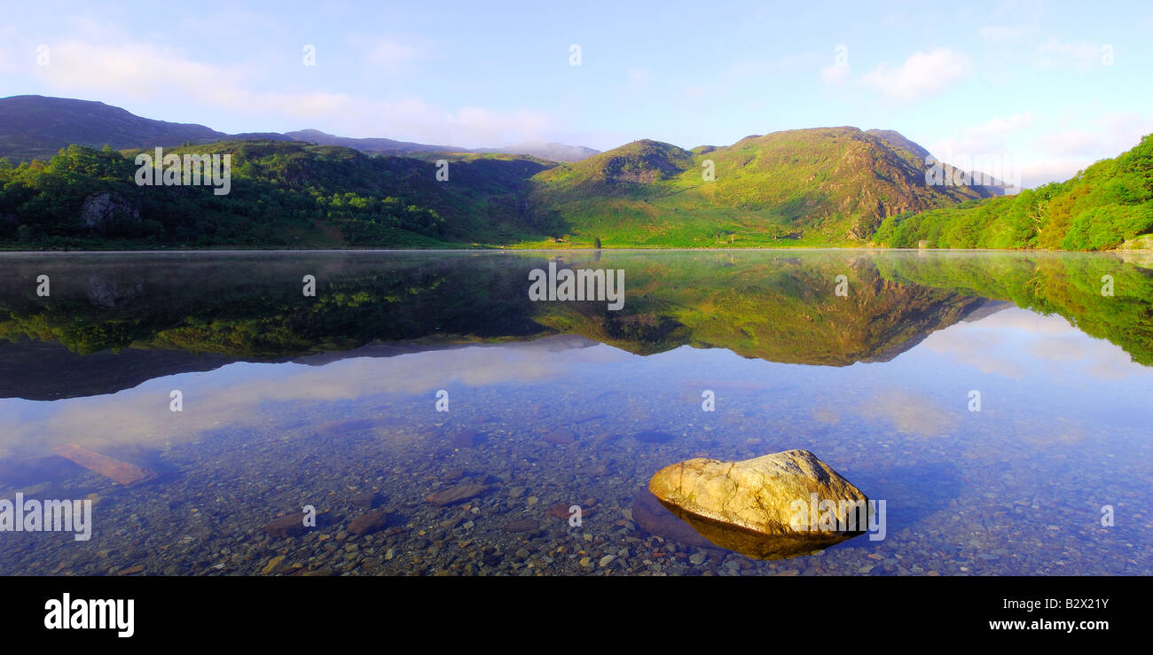 A beautifully calm morning at Llyn Dinas in Snowdonia national park North Wales Stock Photo