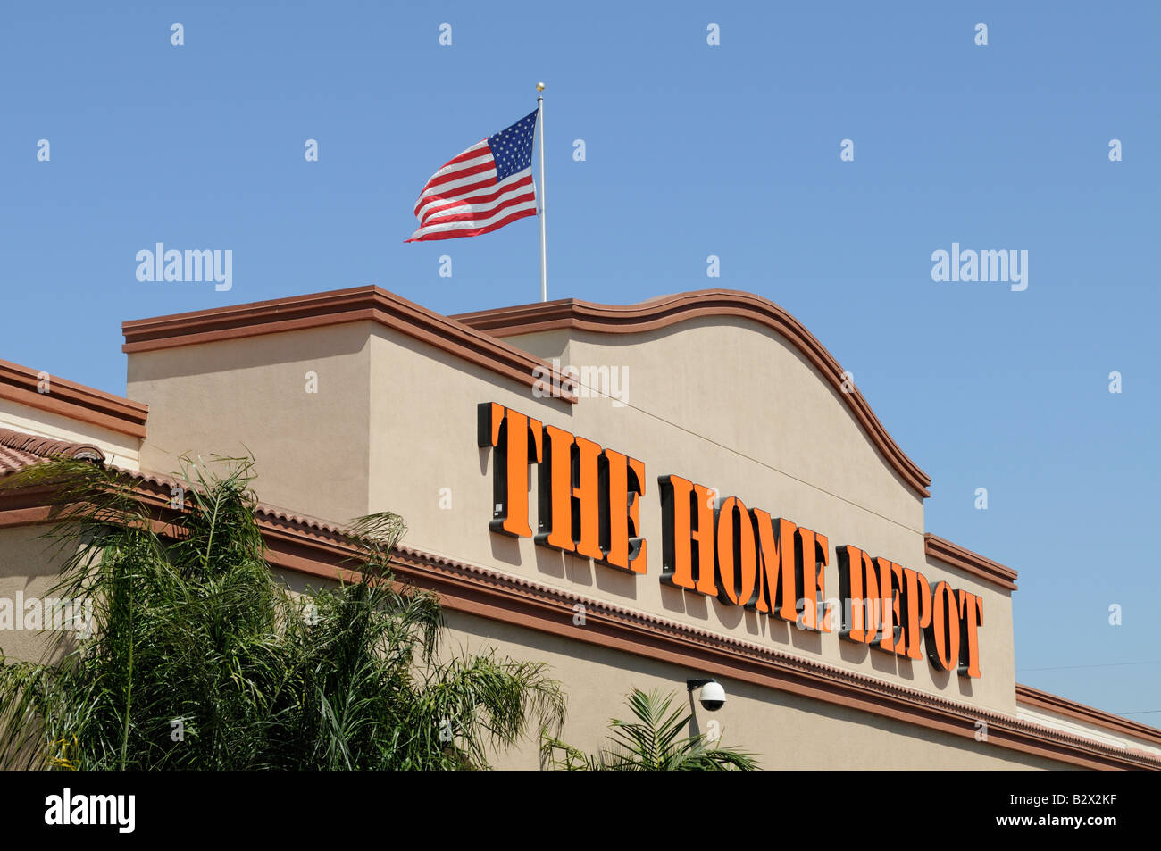 Home Depot entrance sign and flag Stock Photo
