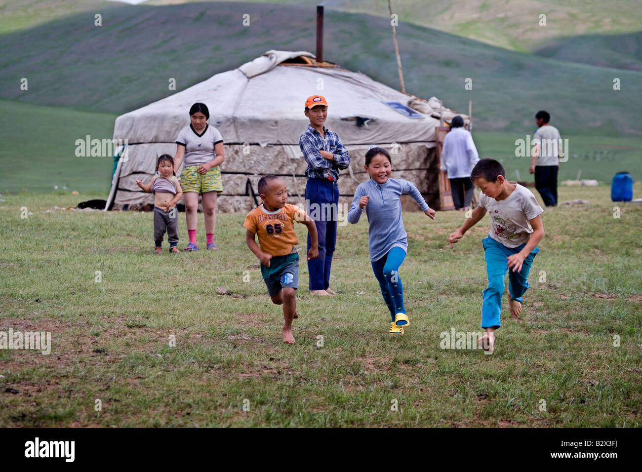 The family of Gantwag outside their traditional ger felt nomadic tent ...