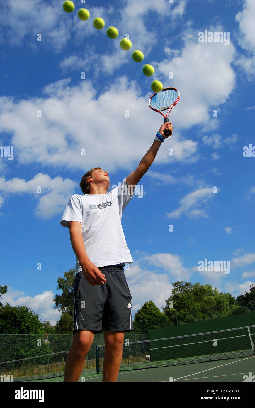 Tennis player hitting volley, Twickenham, Richmond upon Thames, Greater London, England, United Kingdom Stock Photo