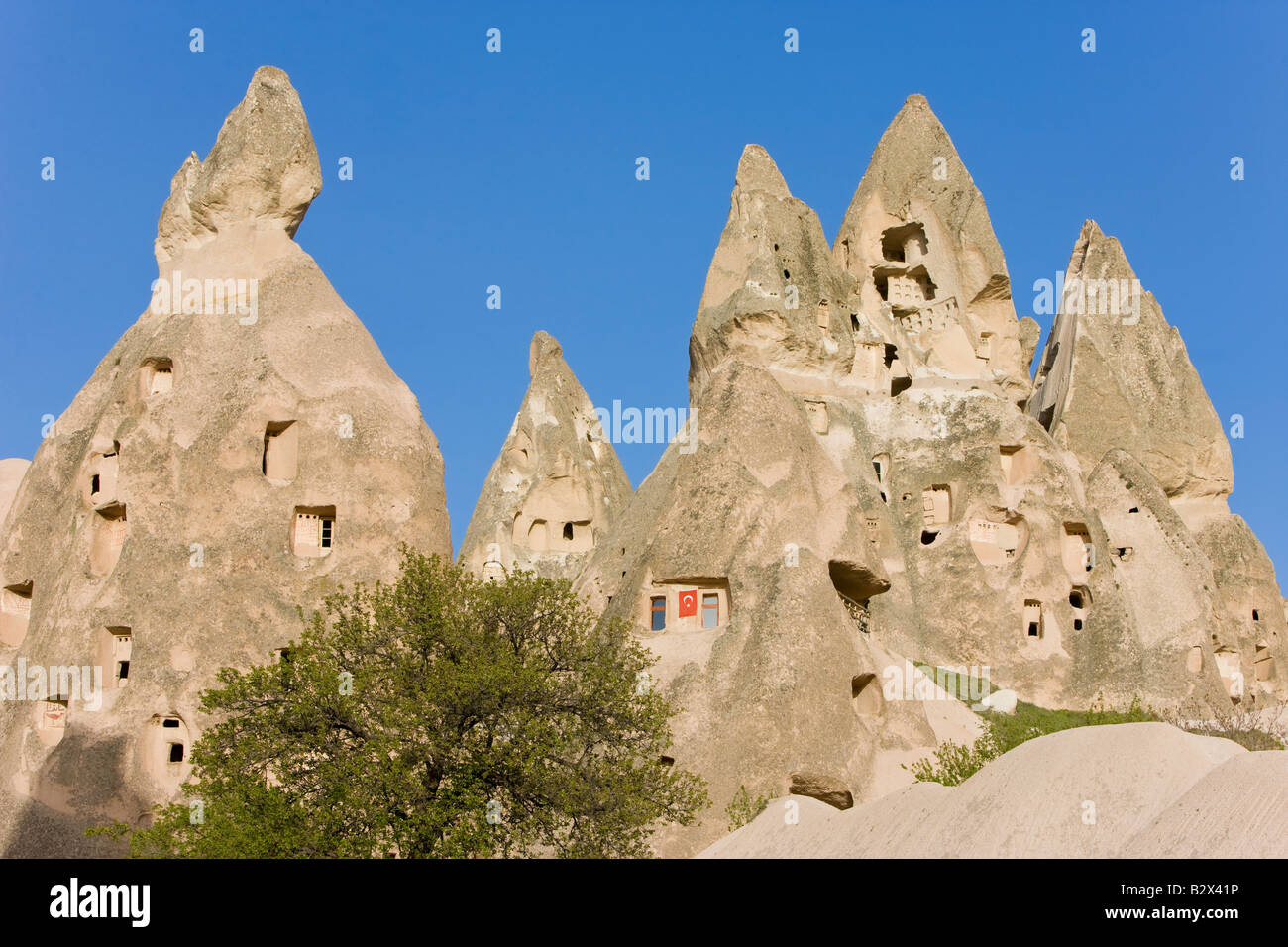 Old troglodytic cave dwellings and the rock Castle of Uchisar, Cappadocia, Anatolia, Turkey, Asia Minor, Eurasia Stock Photo