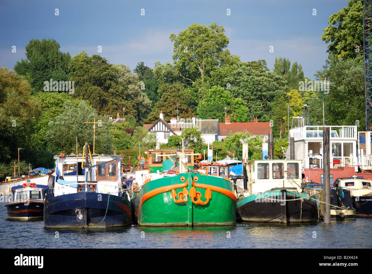 Boats moored on River Thames, Embank Riverside, Twickenham, Richmond Upon Thames, Greater London, England, United Kingdom Stock Photo