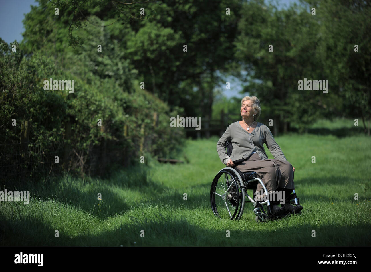 Annie Maw pictured at home in Pilton Somerset, in her wheelchair. Stock Photo