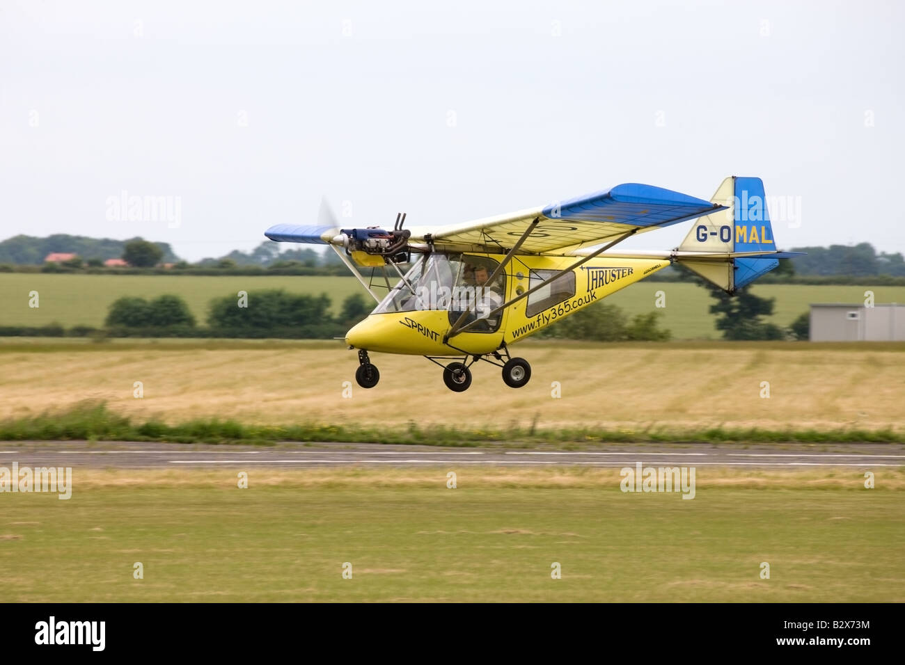 Thruster T600N-450 Sprint G-OMAL micrilight aircraft taking-off from Wickenby Airfield Stock Photo