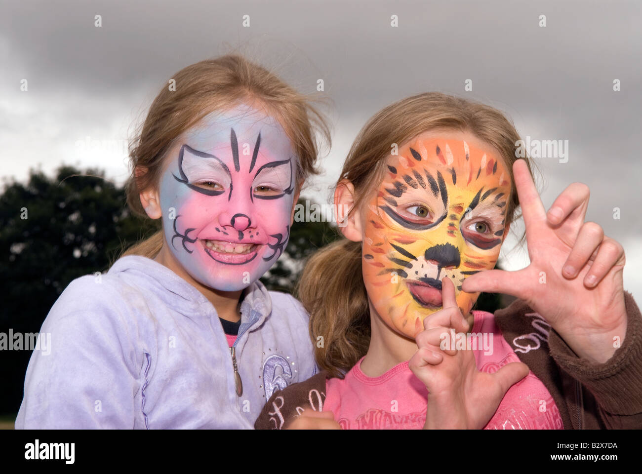 Free Photos - Two Young Children With Their Faces Painted In