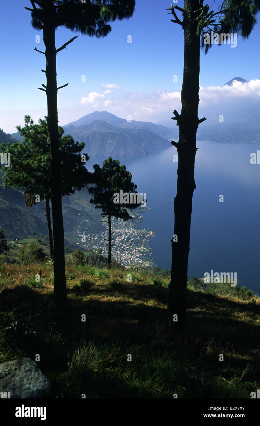 Lake Atitlan in the early morning with San Antonio Palopo on the left and Toliman Volcano and San Pedro Volcanoes Stock Photo